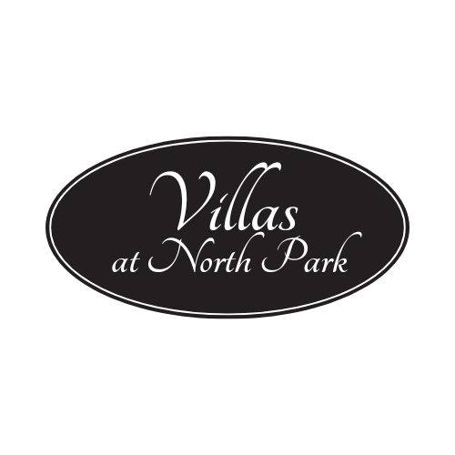 the logo of villages at north park on a green background